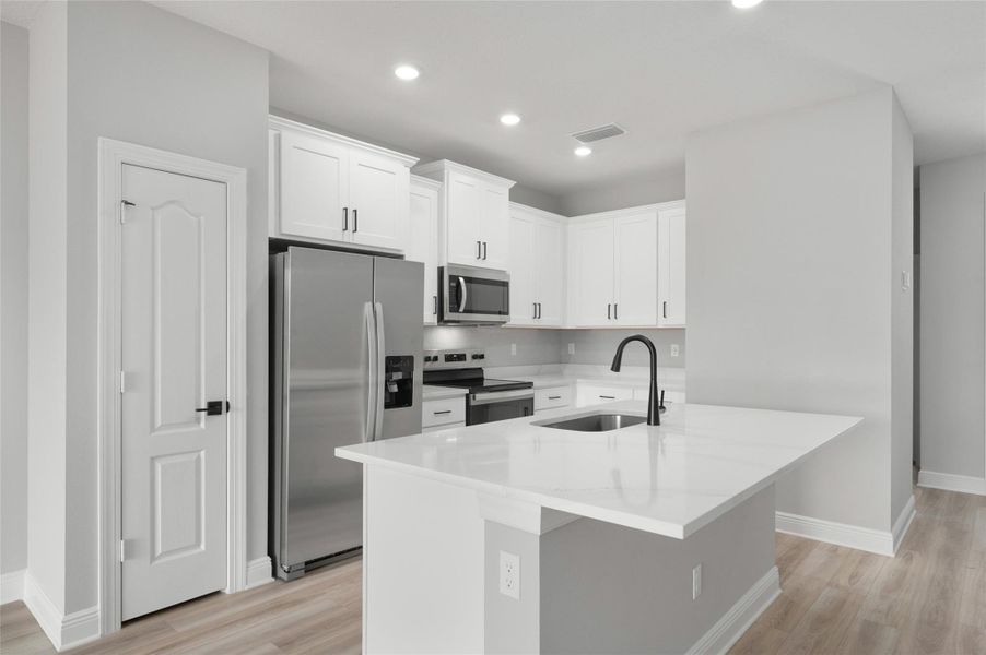 Furnished interior view inside a new home in Celebration Pointe, Fort Pierce (Image 6).