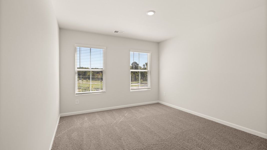 Spacious, unfurnished interior of a new home in Brookland Commons, Monroe (Image 22).
