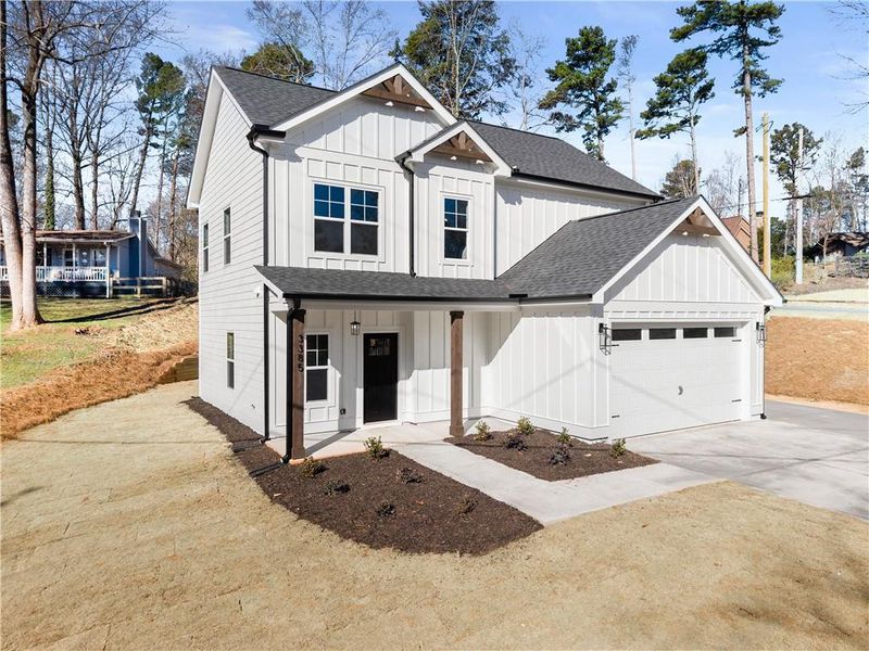 Front exterior of a new home in , Cumming, GA, highlighting curb appeal (Image 16).