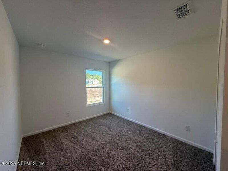 Spacious, unfurnished interior of a new home in Grand Reserve, Bunnell (Image 25).
