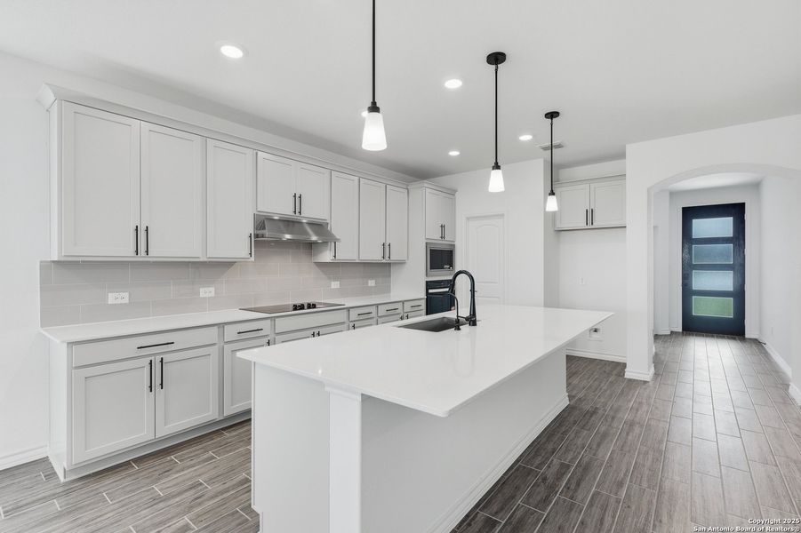 Furnished interior view inside a new home in Bison Ridge, San Antonio (Image 3).