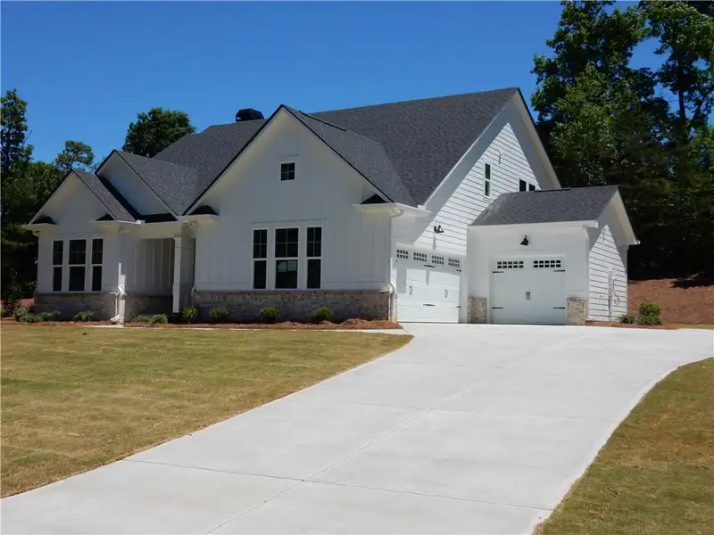 Front exterior of a new home in , Demorest, GA, highlighting curb appeal (Image 10).