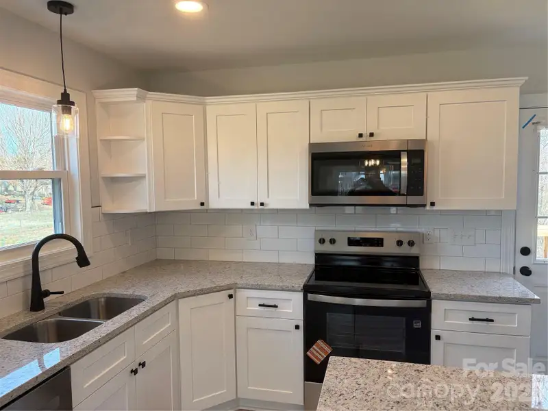 Furnished interior view inside a new home in , Statesville (Image 6).