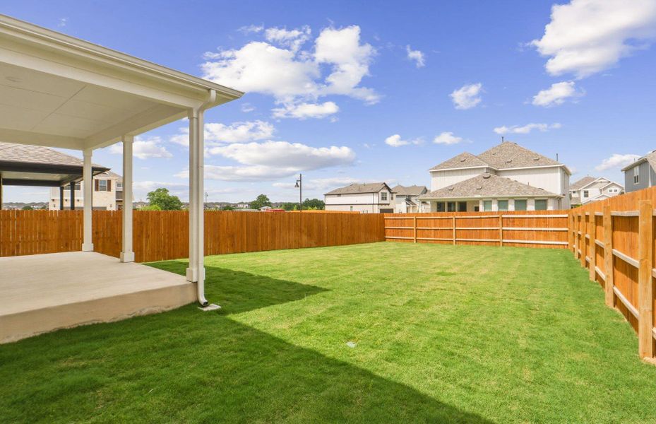 Exterior details and patio area of a home in Santa Rita Ranch, Liberty Hill (Image 16).