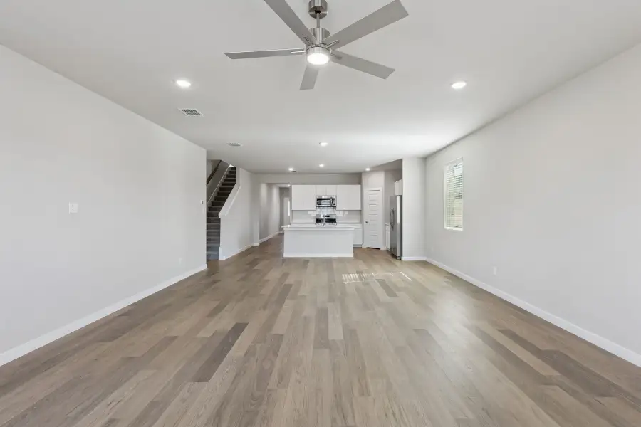 Open First Floor in the Holden home plan by Trophy Signature Homes – REPRESENTATIVE PHOTO