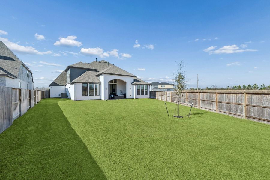 The oversized, corner lot is waiting for your touches. A pool, putting green, firepit or all of the above...let your imagination run wild!