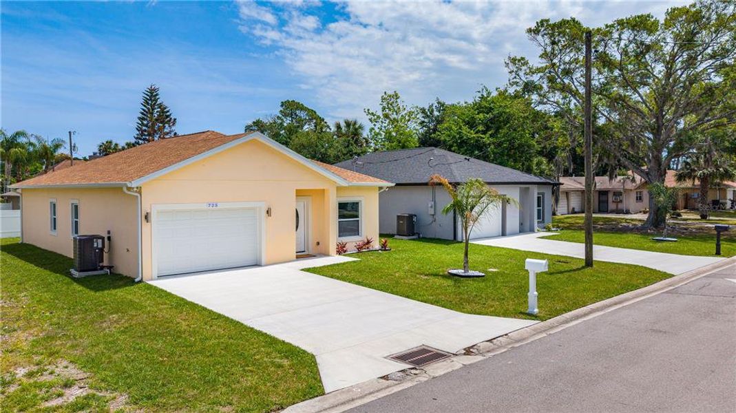 Front exterior of a new home in , Daytona Beach, FL, highlighting curb appeal (Image 24).