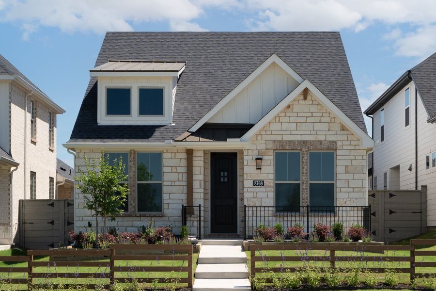 Front exterior of a new home in Treeline, Justin, TX, highlighting curb appeal (Image 1). Front exterior of a new home in Treeline, Justin, TX, highlighting curb appeal (Image 1).