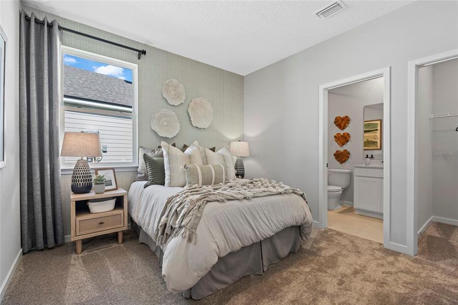 Furnished interior view inside a new home in The Cypress Series at Reserve East, Flagler Beach (Image 19).