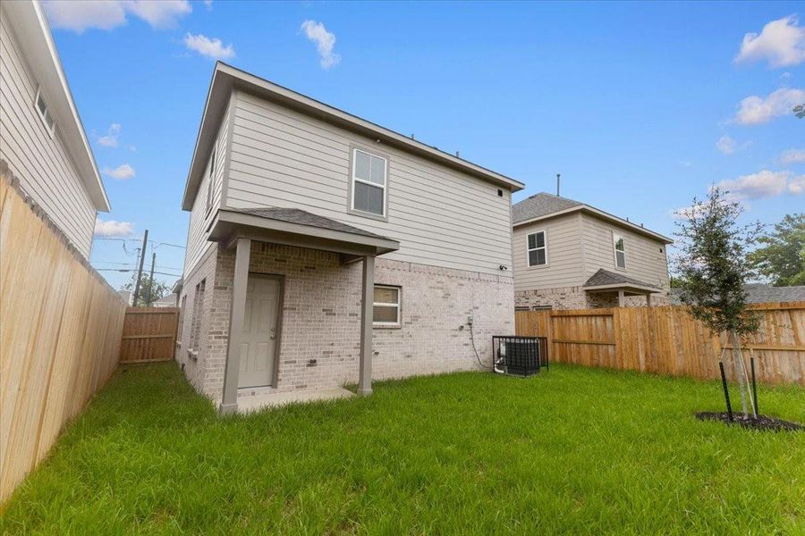 Exterior details and patio area of a home in , Houston (Image 3). Exterior details and patio area of a home in , Houston (Image 3).