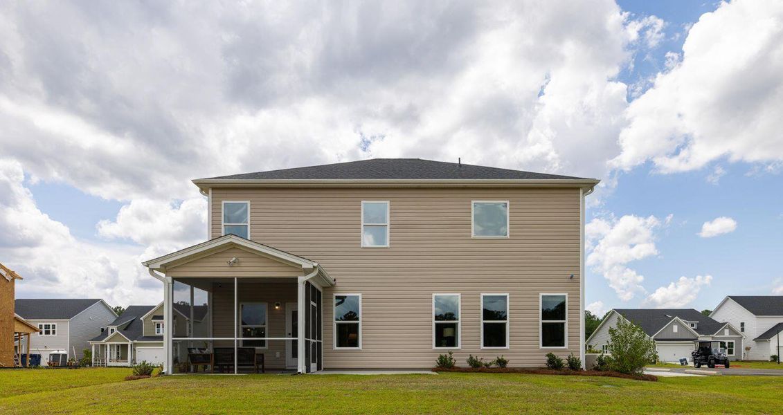Exterior details and patio area of a home in The Oaks, Goose Creek (Image 20).