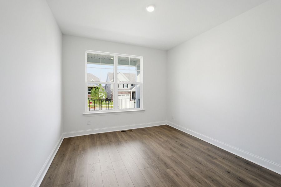 Spacious, unfurnished interior of a new home in McCain's Station, Gallatin (Image 24).