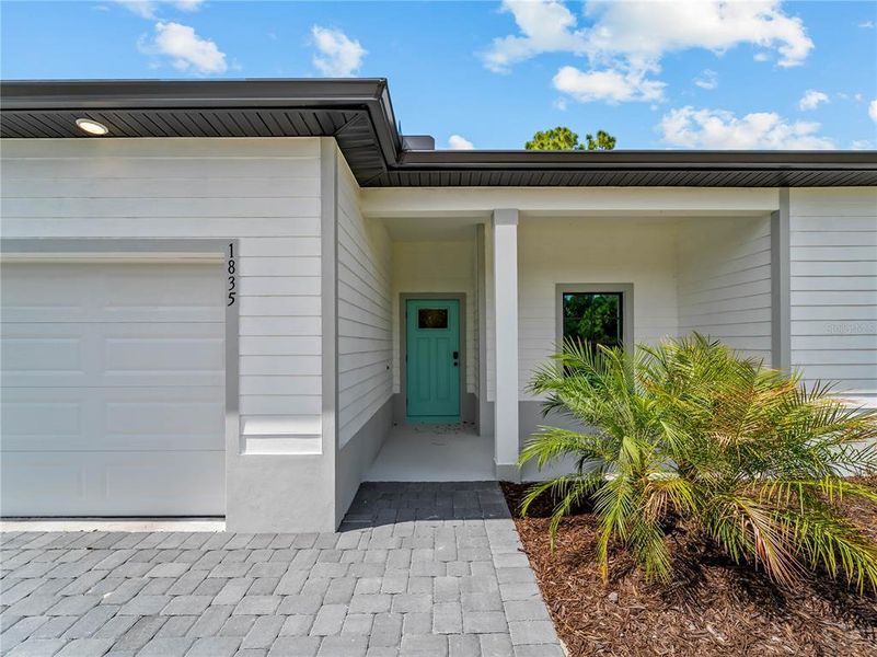 Exterior details and patio area of a home in , North Port (Image 42).