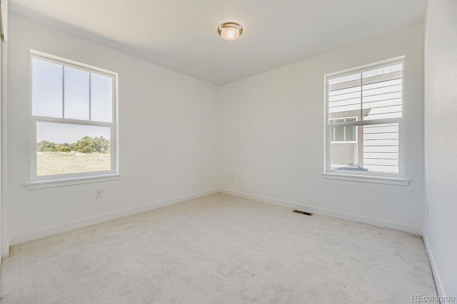 Spacious, unfurnished interior of a new home in Vermilion Creek: The Pioneer Collection, Centennial (Image 7).