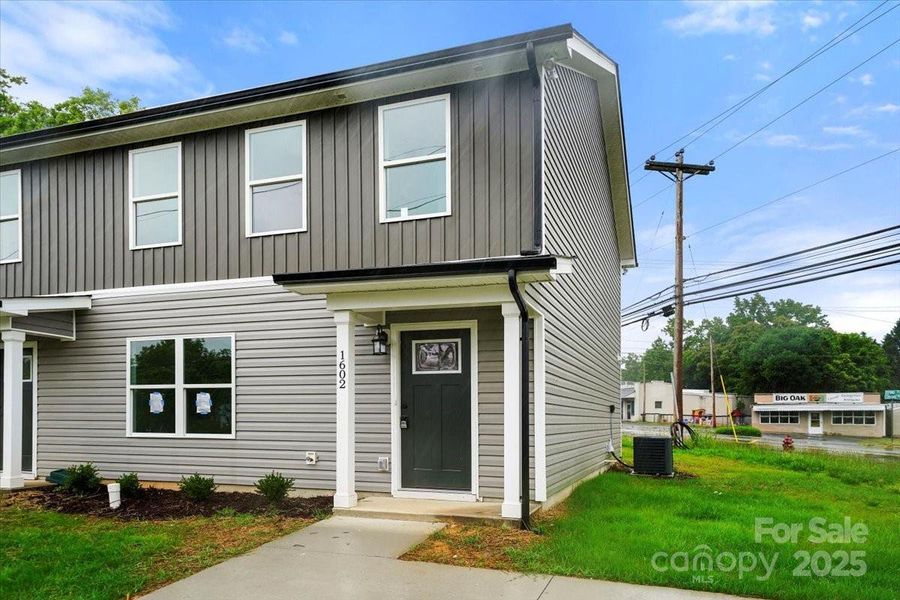 Front exterior of a new home in , Albemarle, NC, highlighting curb appeal (Image 19).