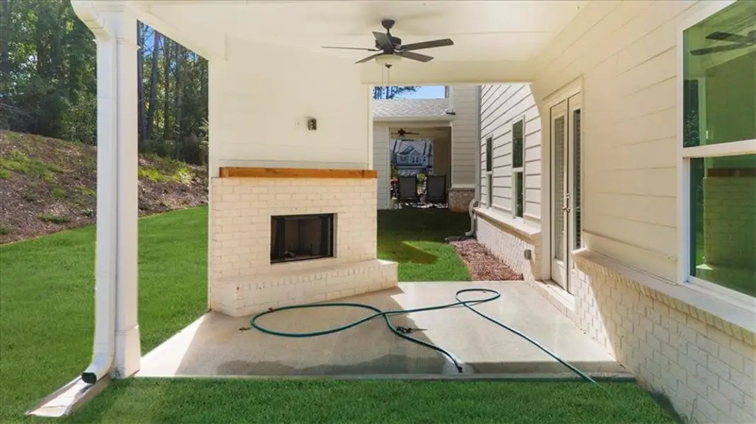Exterior details and patio area of a home in , Flowery Branch (Image 26).