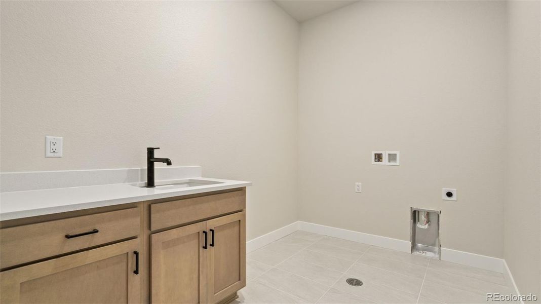 Furnished interior view inside a new home in Pelican Shores at Water Valley, Windsor (Image 6).