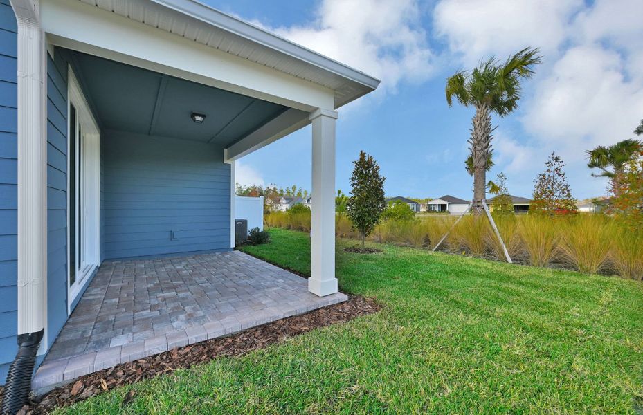 Exterior details and patio area of a home in Del Webb Wildlight, Yulee (Image 3).