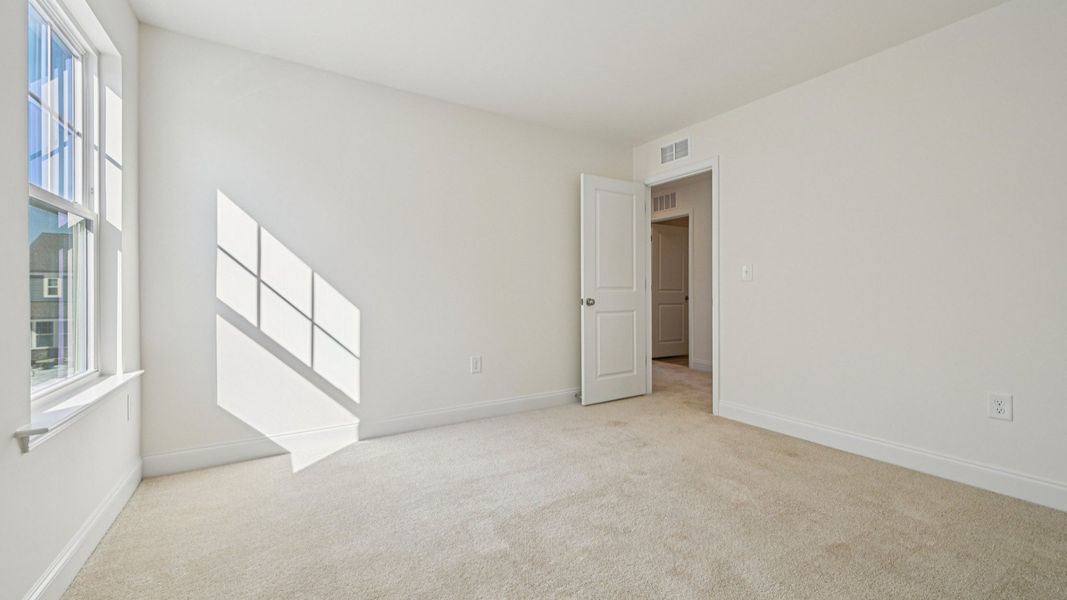 Representative furnished interior of a home built from the Wagener by DRB Homes in Station Pointe, Angier (Image 36).