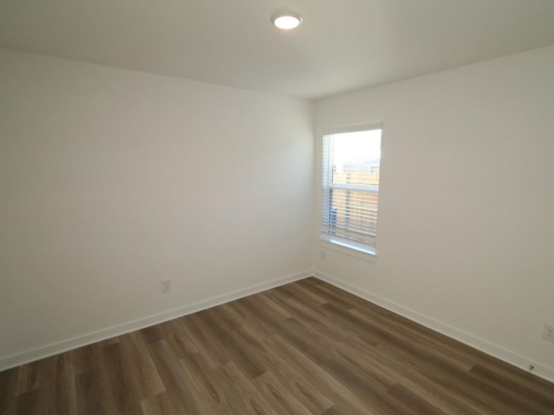 Spacious, unfurnished interior of a new home in Ambrose, La Marque (Image 30).