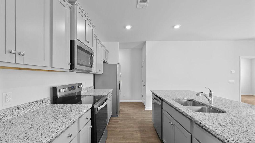 Representative furnished interior of a home built from the MANNING by D.R. Horton in Hillcrest, Ravenel (Image 6). Representative furnished interior of a home built from the MANNING by D.R. Horton in Hillcrest, Ravenel (Image 6).
