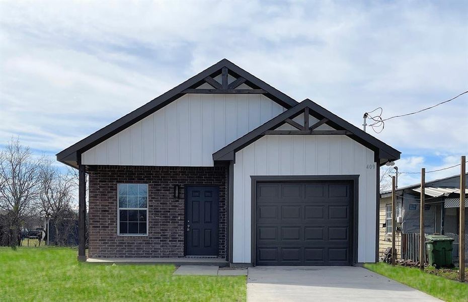 A representation of the home's appearance after a new owner installs sod or plants grass.