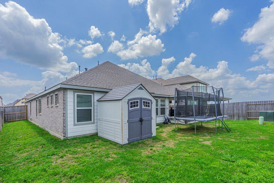 Exterior details and patio area of a home in , Waller (Image 22).