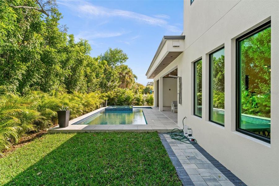 Exterior details and patio area of a home in , Sarasota (Image 36).