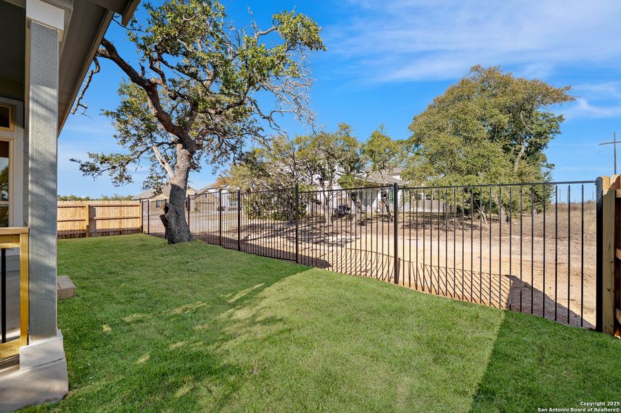 Exterior details and patio area of a home in Ventana, Bulverde (Image 20).