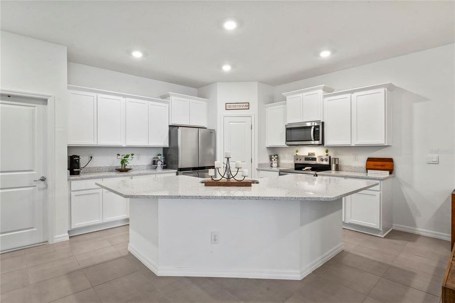 Furnished interior view inside a new home in Towns at Woodsdale, Wesley Chapel (Image 32).