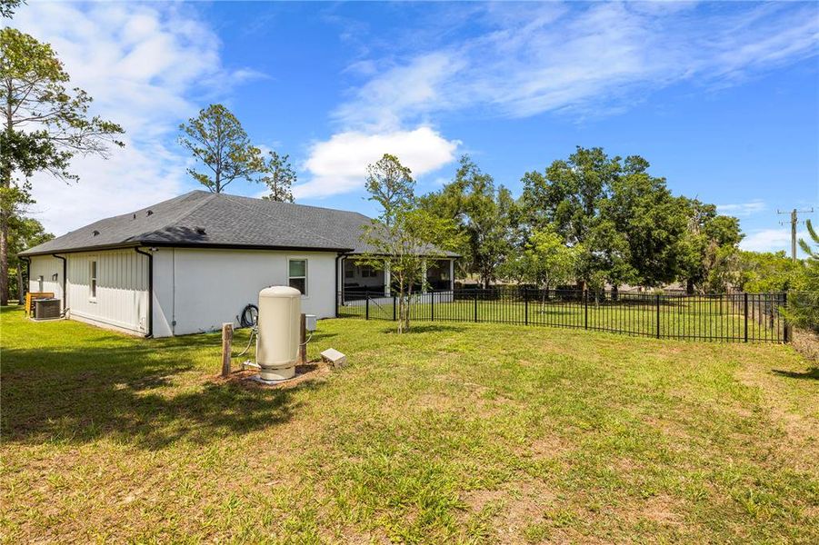 Exterior details and patio area of a home in , Dade City (Image 36).