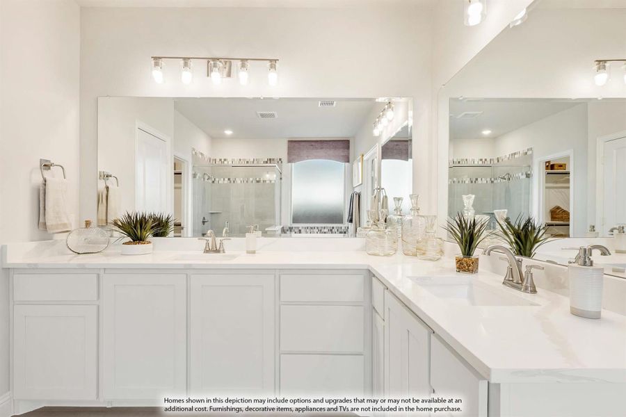 Dual-sink bathroom vanity with white cabinets, quartz countertops, and large mirrors with overhead lighting Dual-sink bathroom vanity with white cabinets, quartz countertops, and large mirrors with overhead lighting