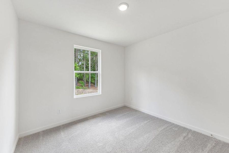 Spacious, unfurnished interior of a new home in Kinsale, Macon (Image 11).