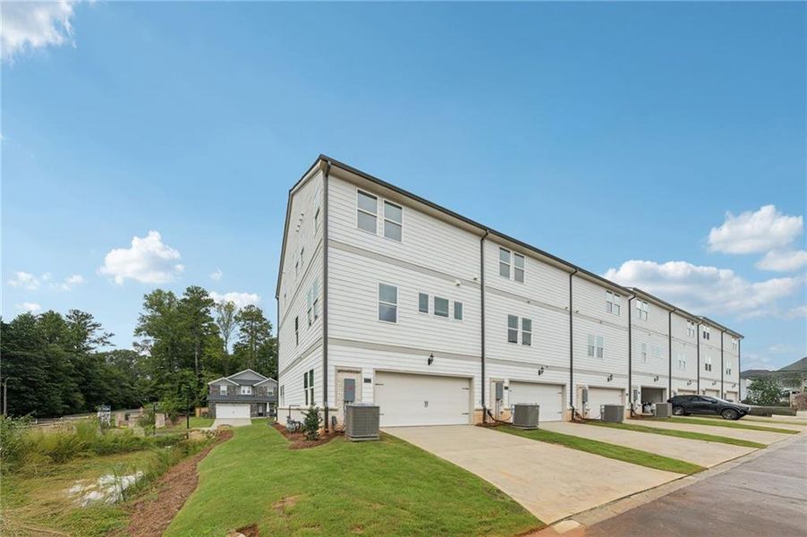 Exterior details and patio area of a home in Martin Springs - Highland Series, Lawrenceville (Image 25).