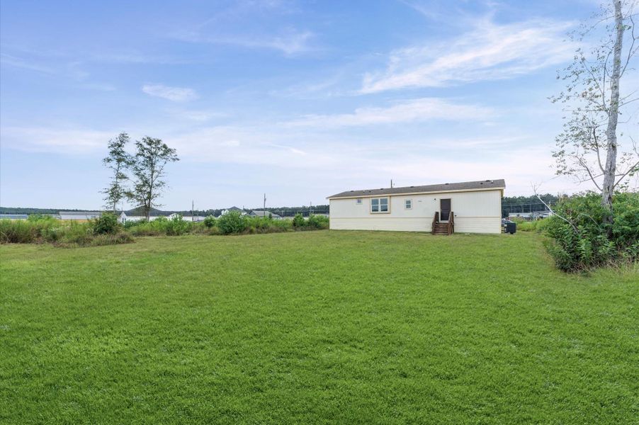 Front exterior of a new home in , Huffman, TX, highlighting curb appeal (Image 24). Front exterior of a new home in , Huffman, TX, highlighting curb appeal (Image 24).