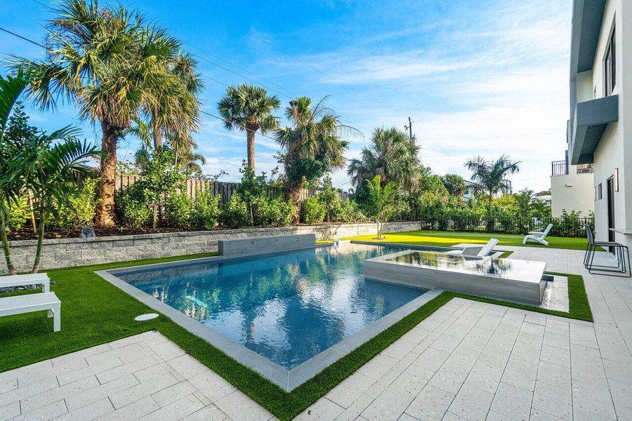 Exterior details and patio area of a home in , Juno Beach (Image 38).