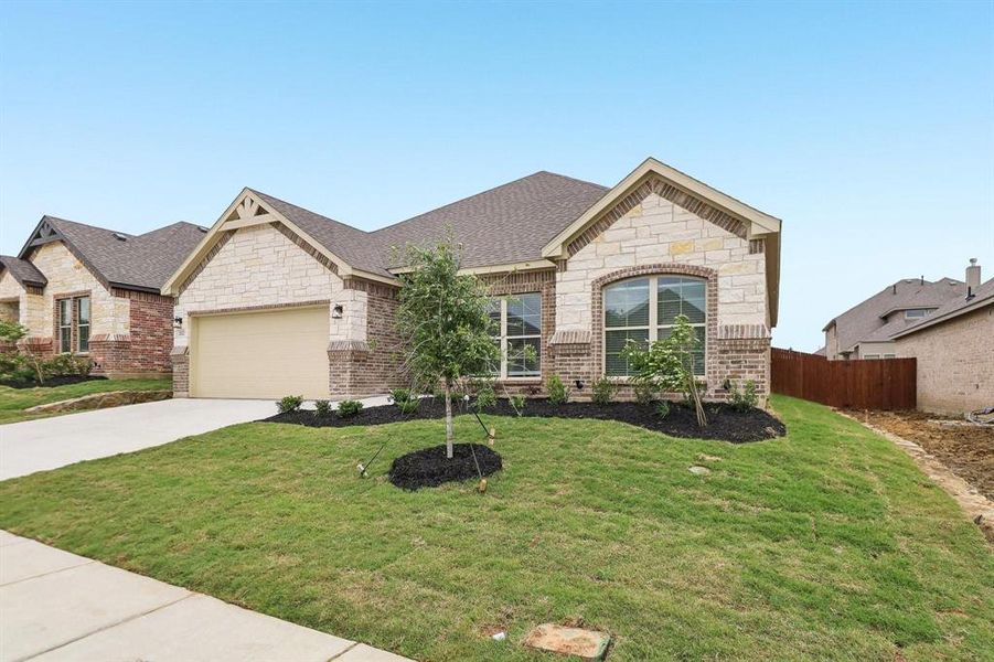 Front exterior of a new home in , Alvarado, TX, highlighting curb appeal (Image 18).