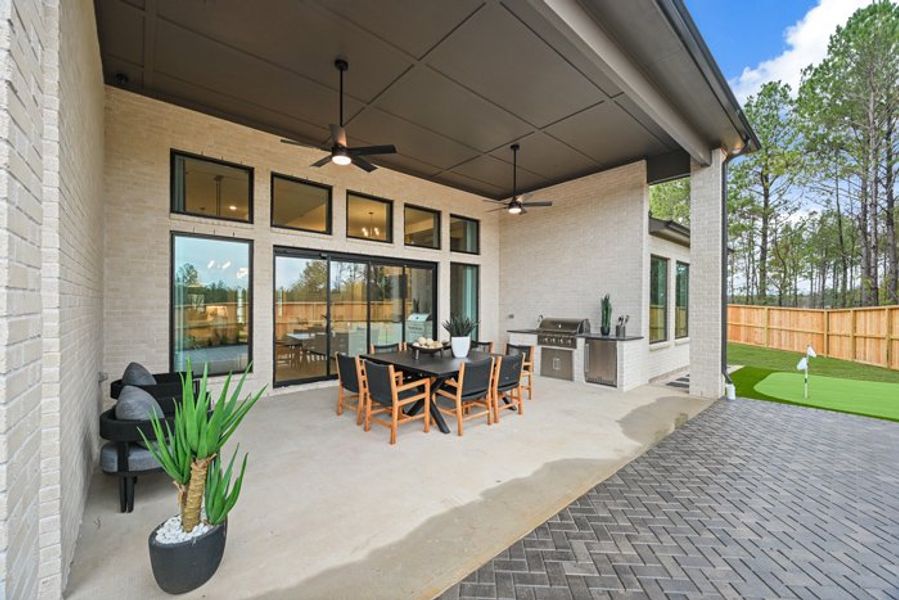 Exterior details and patio area of a home in Wildtree 70', Montgomery (Image 24).
