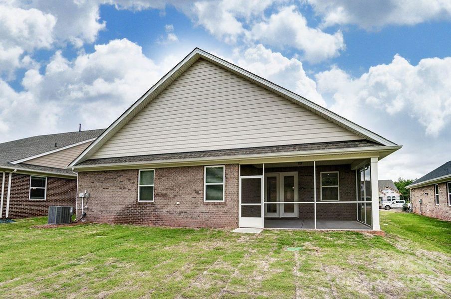 Back of Home with Screened Porch-Similar to Subject Property