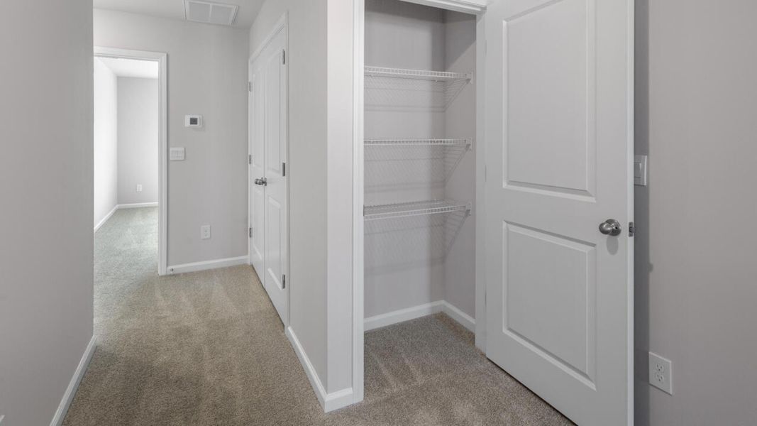 Spacious, unfurnished interior of a new home in The Landing at Sidbury Station, Castle Hayne (Image 21).