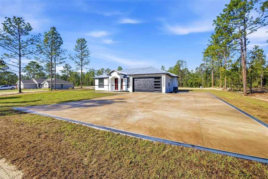 Front exterior of a new home in , Ocala, FL, highlighting curb appeal (Image 26).