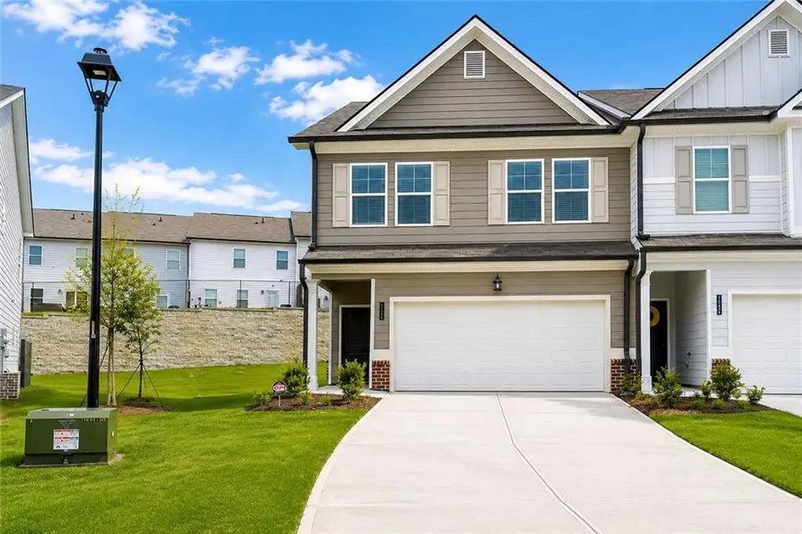 Front exterior of a new home in , Atlanta, GA, highlighting curb appeal (Image 1). Front exterior of a new home in , Atlanta, GA, highlighting curb appeal (Image 1).