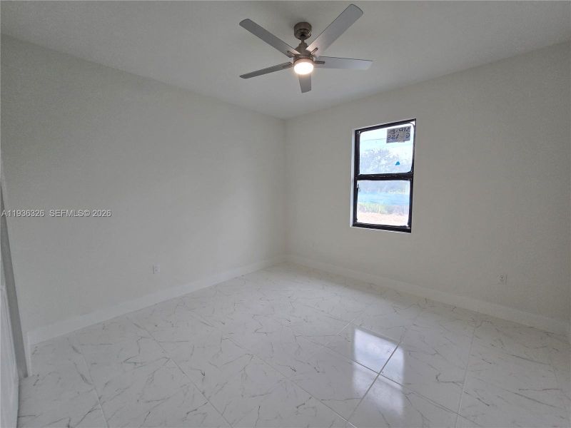 Spacious, unfurnished interior of a new home in , Lehigh Acres (Image 13).