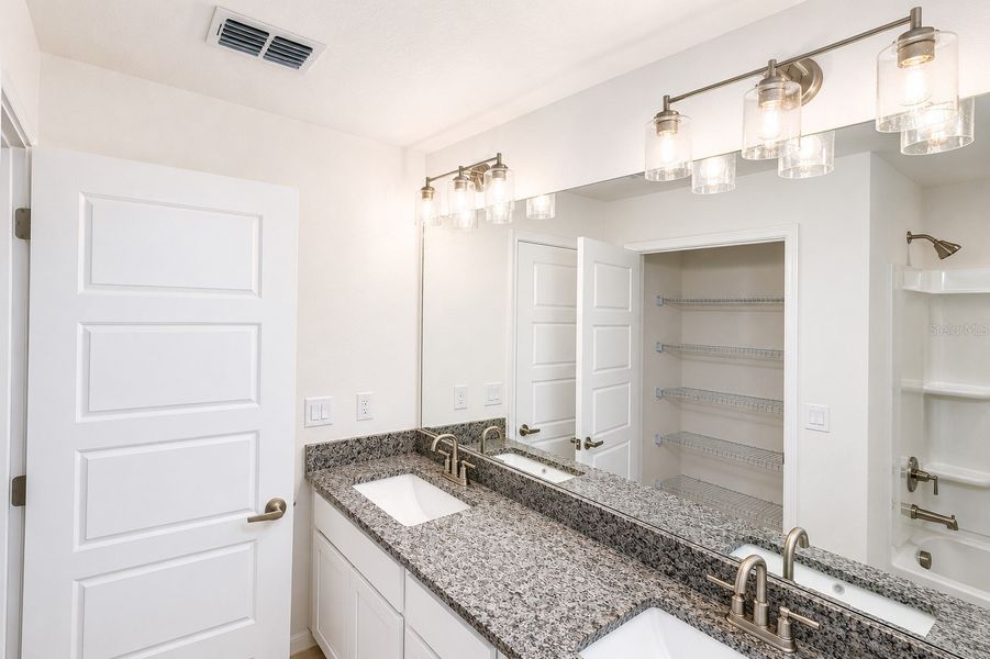 Furnished interior view inside a new home in Harmony Central, St. Cloud (Image 15).