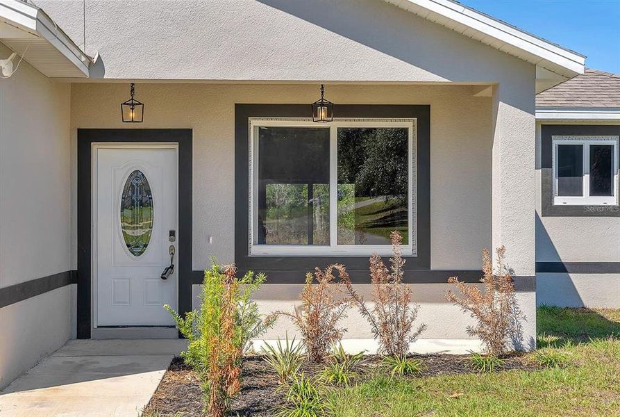 Exterior details and patio area of a home in , Ocala (Image 4).