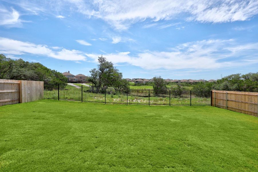 Front exterior of a new home in Lakeside at Tessera - 60', Lago Vista, TX, highlighting curb appeal (Image 22). Front exterior of a new home in Lakeside at Tessera - 60', Lago Vista, TX, highlighting curb appeal (Image 22).