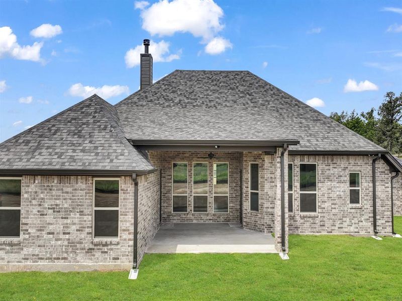 Front exterior of a new home in , Azle, TX, highlighting curb appeal (Image 24). Front exterior of a new home in , Azle, TX, highlighting curb appeal (Image 24).