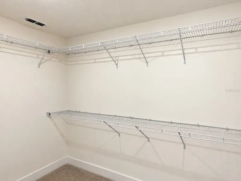 Spacious, unfurnished interior of a new home in Harmony Central, St. Cloud (Image 15).