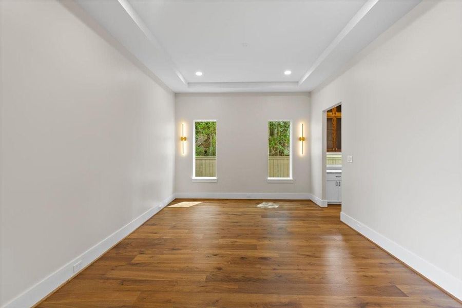 Dining room with sconces with easy access to butlers pantry and scullery kitchen