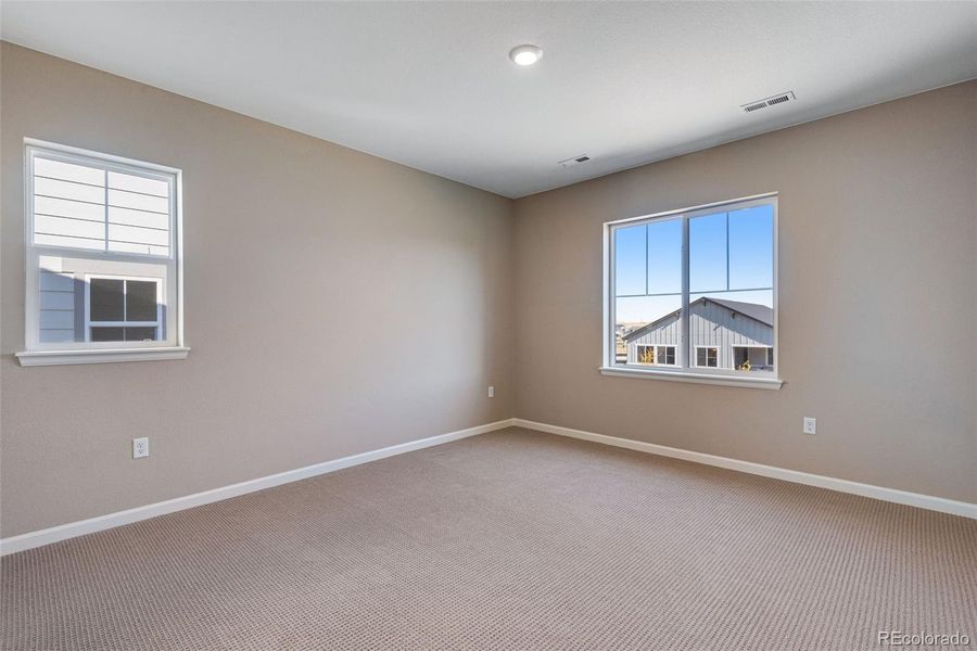 Spacious, unfurnished interior of a new home in Ensemble at The Aurora Highlands, Aurora (Image 18). Spacious, unfurnished interior of a new home in Ensemble at The Aurora Highlands, Aurora (Image 18).